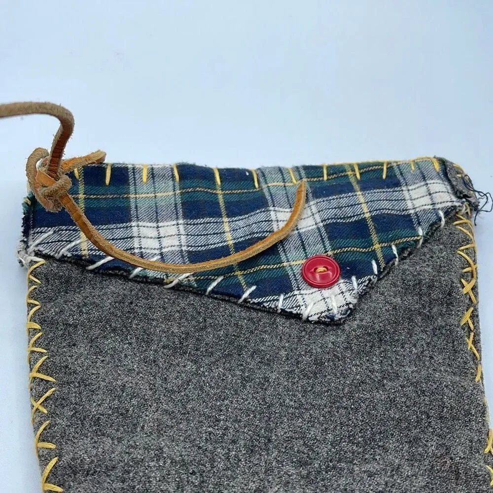 Vintage handmade grey wool Christmas stocking.